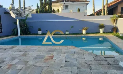 Casa em condomínio fechado com 4 quartos para alugar no Jardim Acapulco, Guarujá 