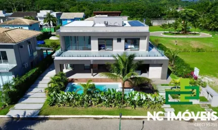 LOCAÇÃO POR TEMPORADA | LUXUOSA CASA EM CONDOMÍNIO PÉ NA AREIA.