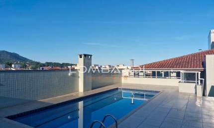 Lindo Apto na Praia Grande – 2 Dorms (1 Suíte) – Cond. com Piscina –
