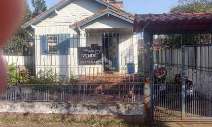 Casa com 2 quartos à venda na Rua Caetés, 278, Centro, Canoas por R$ 400.000