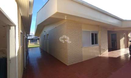 Casa com 5 quartos à venda na Maracanã, 260, Arroio Teixeira, Capão da Canoa por R$ 900.000