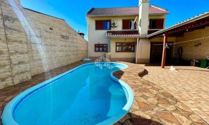 Casa com 3 quartos à venda na Rua Ernesto da Silva Rocha, 1254, Estância Velha, Canoas por R$ 584.000