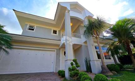 Casa em condomínio fechado com 3 quartos à venda na Rua Monte Castelo, 2007, Marechal Rondon, Canoas por R$ 2.890.000