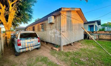 Casa com 3 quartos à venda na Rua Júlio Pereira de Souza, 533, Estância Velha, Canoas por R$ 234.000