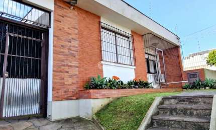Casa com 4 quartos à venda na Rua Aneron Corrêa de Oliveira, 160, Jardim do Salso, Porto Alegre por R$ 1.100.000