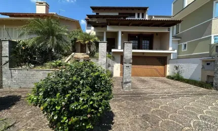 Casa com 4 quartos à venda na Rua Vinícius de Moraes, 265, Marechal Rondon, Canoas por R$ 1.550.000