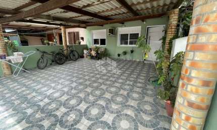 Casa em condomínio fechado com 2 quartos à venda na Rua Camboatás, 195, Igara, Canoas por R$ 284.000