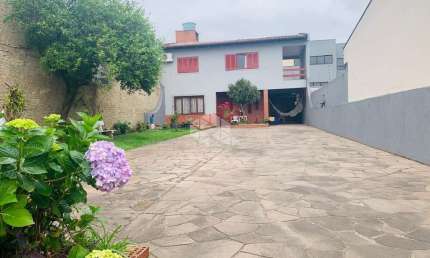 Casa com 3 quartos à venda na Rua Expedicionário, 143, Nossa Senhora das Graças, Canoas por R$ 625.000