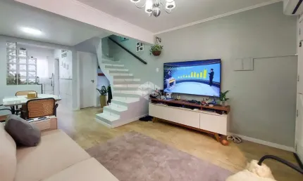Casa em condomínio fechado com 2 quartos à venda na Rua Treze de Maio, 630, Rio Branco, Canoas por R$ 365.000