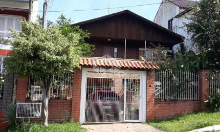 Casa com 4 quartos à venda na Avenida Doutor Sezefredo Azambuja Vieira, 5729, Olaria, Canoas por R$ 640.000