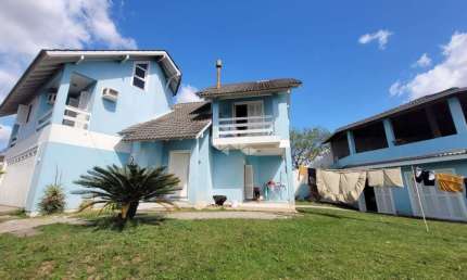 Casa em condomínio fechado com 4 quartos à venda na Rua Acácias, 161, Feitoria, São Leopoldo por R$ 900.000