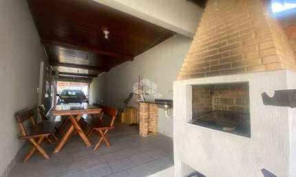 Casa com 3 quartos à venda na Rua Clóvis Beviláqua, 166, Harmonia, Canoas por R$ 550.000