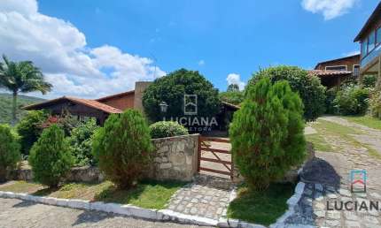 Excelente casa com 4 suítes em condomínio com vista!