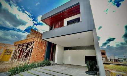 Casa à venda de alto padrão na Grande Florianópolis Deltaville, 3 suítes com 2 vagas de garagem em residência totalmente planejada