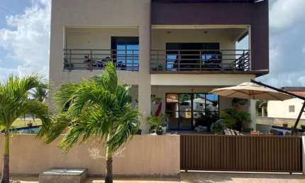 Imperdível casa em condomínio na cidade de Lucena-PB, bairro Camaçari: 7 quartos, 6 suítes, 3 salas, 1 vaga, 248m².