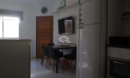 Casa em condomínio fechado com 2 quartos à venda na Rua Sebastião Wolf, 281, Nonoai, Porto Alegre por R$ 510.100