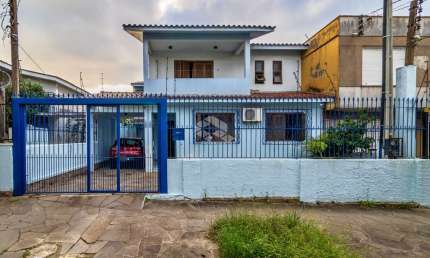 Casa com 3 quartos à venda na Rua Coronel Jaime da Costa Pereira, 318, Partenon, Porto Alegre por R$ 877.000