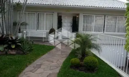 Casa com 5 quartos à venda na Avenida General Barreto Viana, 430, Chácara das Pedras, Porto Alegre por R$ 1.550.000