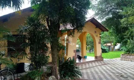 Casa com 4 quartos à venda na rua antônio da silva só, 421, belém novo, porto alegre por r$ 1.400.000