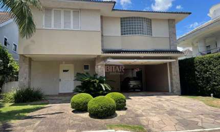 SOBRADO EM CONDOMINIO FECHADO COM 350 m² COM 4 SUITES
