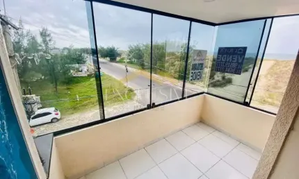 Apartamento 03 dormitórios a beira mar com sacada em Tramandaí