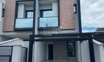 Exclusividade e conforto no saguaçu: geminado alto padrão