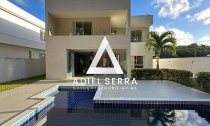 Alphaville litoral 3 - 4 quartos sendo 3 suítes - 2 lavabos - 4 vagas - Piscina e área gourmet - Sala ampla com pé direito duplo