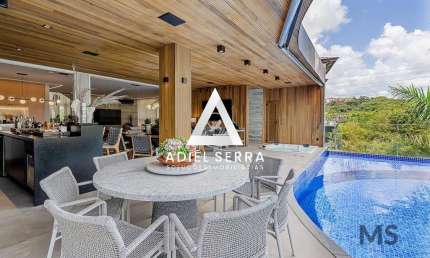 Alphaville Salvador 2 - 660m² - 4 pavimentos - Mobiliada - 5 quartos sendo 4 suítes - Closet - Piscina - Energia solar - Escritório - 5 vagas