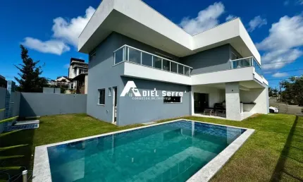 Alphaville Litoral Norte 2 - 415m² - PORTEIRA FECHADA - Vista verde - 2 pavimentos - 4 suítes - Piscina - Espaço gourmet - Armários - 3 vagas