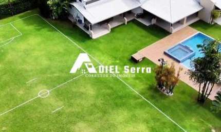 Encontro das Águas - 3.998m² total - 5 suítes - Master c/ closet - 6 quartos - Gabinete - Área gourmet - Piscina - Energia solar - Depósito - 4 vagas