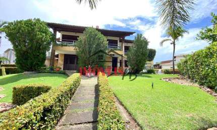 Casa no Condomínio Cabo Branco Privê com área de lazer privativa.