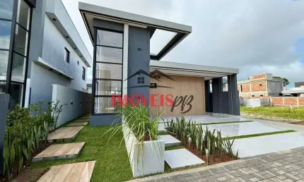 Casa em condomínio fechado com 3 suítes, com terreno amplo.