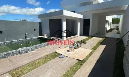 Casa em Carapibus a 500 metros da praia, 3 quartos e área de lazer