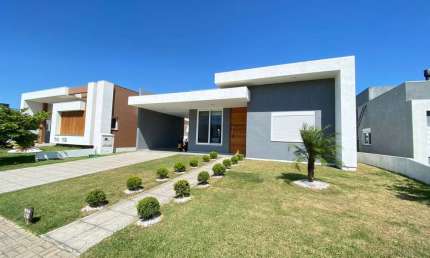 Casa em condomínio fechado com 3 quartos à venda na Rua Onório Germano, 2009, Condomínio Dubai Resort, Capão da Canoa por R$ 1.280.000