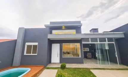 Casa com 3 quartos à venda na Quebra Vento, 400, Araça, Capão da Canoa, 121 m2 por R$ 860.000