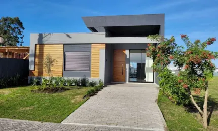 Casa em condomínio fechado com 4 quartos à venda na Rua Rio Camisas, 10, Centro, Xangri-Lá, 150 m2 por R$ 1.550.000