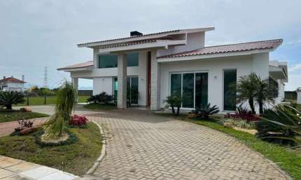 Casa em condomínio fechado com 7 quartos à venda na Estrada Do Mar, 5990, Green Village Golf Club, Xangri-Lá, 508 m2 por R$ 3.500.000