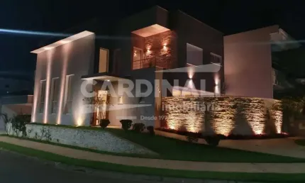 Casa à Venda em Condomínio no bairro Parque Brasil 500 com 3 dormitórios e 4 garagens.