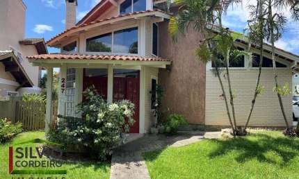 Casa em condomínio fechado com 4 quartos à venda na Rua Liberato Carioni, 247, Lagoa da Conceição, Florianópolis por R$ 3.000.000