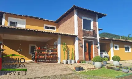 Casa em condomínio fechado com 3 quartos à venda na Rua Vereador Osni Ortiga, 1, Porto da Lagoa, Florianópolis por R$ 4.800.000