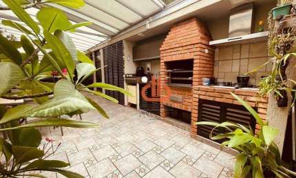 Casa com 3 dormitórios, 177 m² - venda por R$ 1.900.000,00 ou aluguel por R$ 15.930,00/mês - Gonzaga - Santos/SP