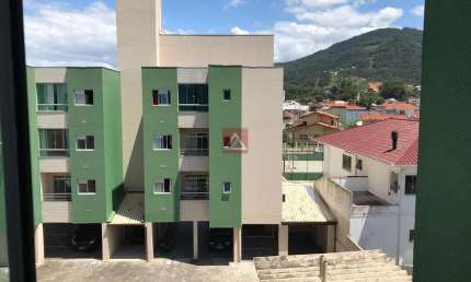APARTAMENTO DE DOIS QUARTOS EM BIGUAÇU NO BAIRRO RIO CAVEIRAS