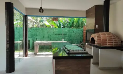 Sobrado a venda em Itamambuca com 8 suites. apenas 130mts da praia