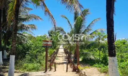 Vendo Excelente Casa com 3/4 em condomínio fechado em frente a praia