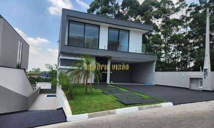 Casa de Alto Padrão á venda com 4 Suítes, sendo 1 Master com Hidro, Área gourmet com Piscina no Condomínio Residencial Real Park - Arujá-SP
