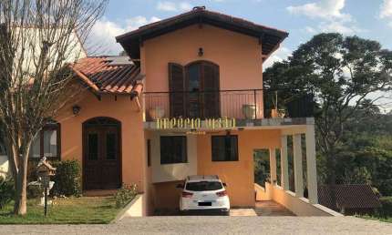Casa à venda com 5 dormitórios, piscina aquecida, no condomínio Aruã em Mogi das Cruzes - SP