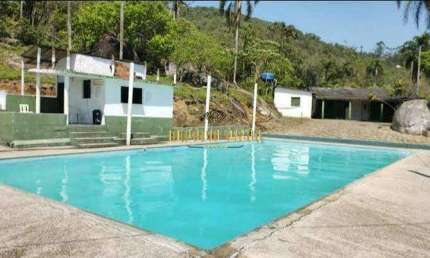 Chácara ampla com piscinas, churrasqueiras e 3 lagos de pesca no bairro Chácara Sete Cruzes - Suzano - SP