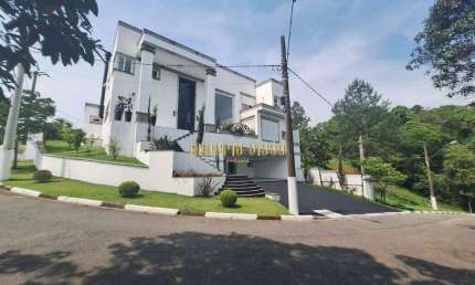 Mansão com 4 Suítes Máster, Cinema, Escritório, Piscina e Sauna; Condomínio de Luxo com Segurança armada de frente com a Rodovia Airton Senna-SP