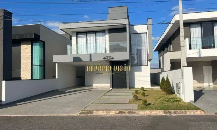 Casa semi-mobiliada com 4 suítes à venda no condomínio Residencial Real Park - Arujá-SP.