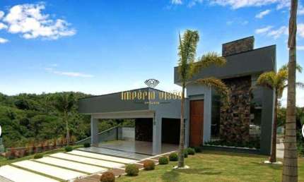 Casa de Alto Padrão à venda com 3 Suítes, sendo 1 Master e Piscina no Condomínio Reserva Ibirapitanga - Santa Isabel-SP